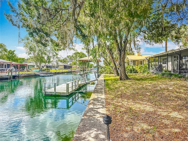 1011 SE 4th Ave, Crystal River, FL 34429 - dock area with a water view and a residential view