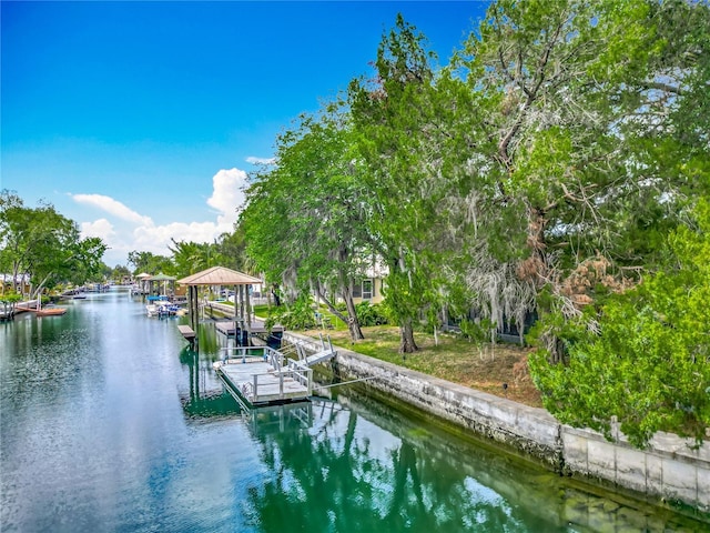 1011 SE 4th Ave, Crystal River, FL 34429 - view of dock featuring a water view and boat lift
