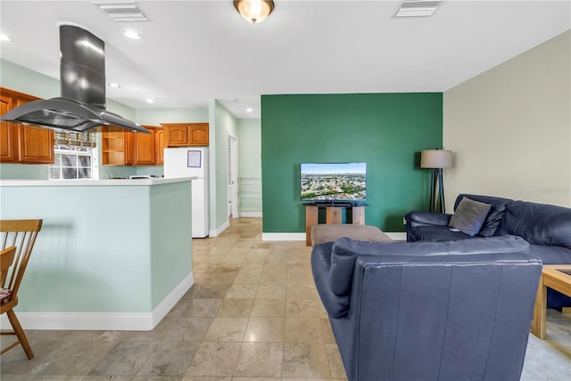 6515 Dimarco Rd, Tampa, FL 33634 - living area featuring baseboards and recessed lighting