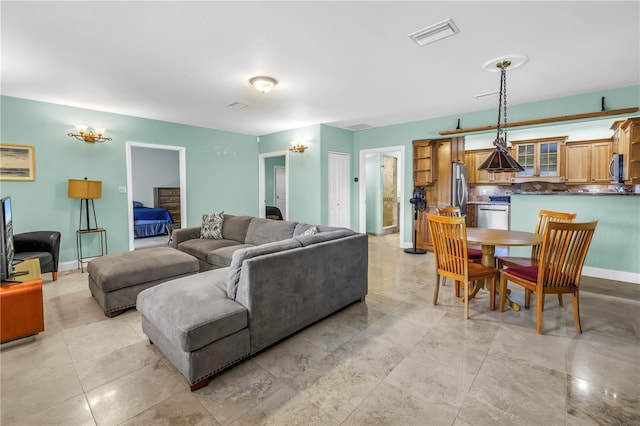 6515 Dimarco Rd, Tampa, FL 33634 - living area featuring baseboards