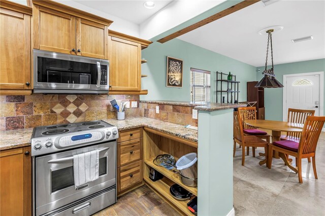 6515 Dimarco Rd, Tampa, FL 33634 - kitchen featuring appliances with stainless steel finishes, open shelves, a peninsula, decorative backsplash, and light stone counters