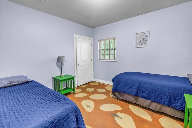 6515 Dimarco Rd, Tampa, FL 33634 - bedroom featuring baseboards