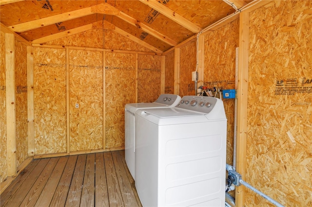 6515 Dimarco Rd, Tampa, FL 33634 - laundry area with washing machine and dryer and hardwood / wood-style floors