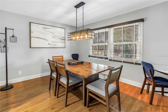 6515 Dimarco Rd, Tampa, FL 33634 - dining space with wood finished floors and baseboards