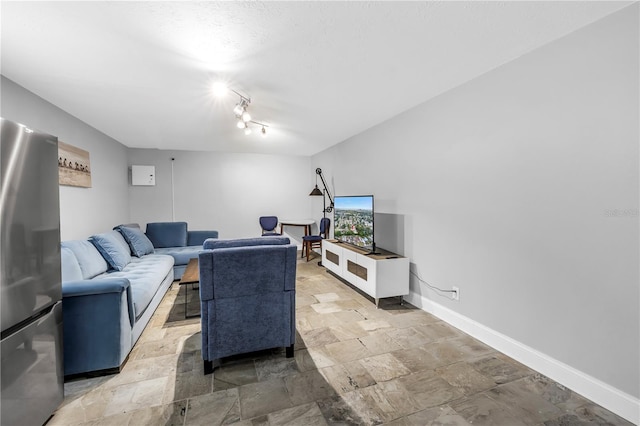 6515 Dimarco Rd, Tampa, FL 33634 - living room with stone tile flooring and baseboards