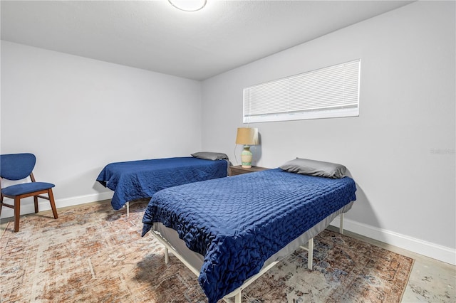 6515 Dimarco Rd, Tampa, FL 33634 - bedroom featuring baseboards