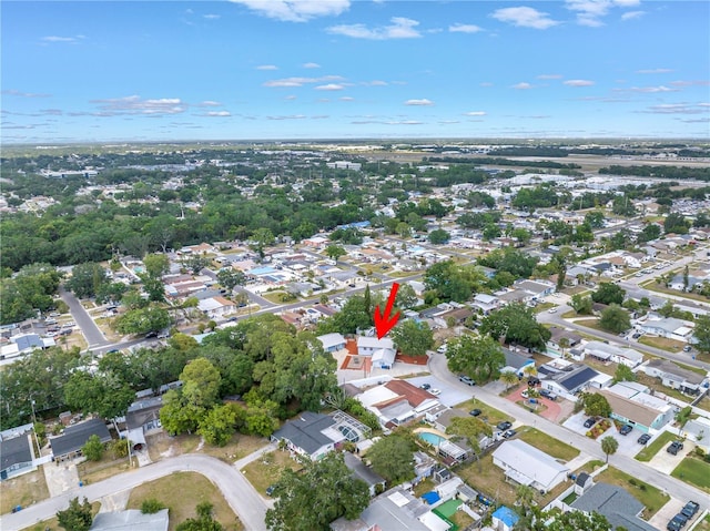 6515 Dimarco Rd, Tampa, FL 33634 - aerial view of property and surrounding area with nearby suburban area