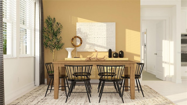 6837 E 115th St, Palmetto, FL 34221 - dining area with wet bar and baseboards