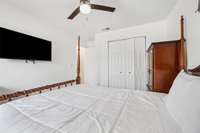 bedroom featuring a closet, visible vents, and a ceiling fan