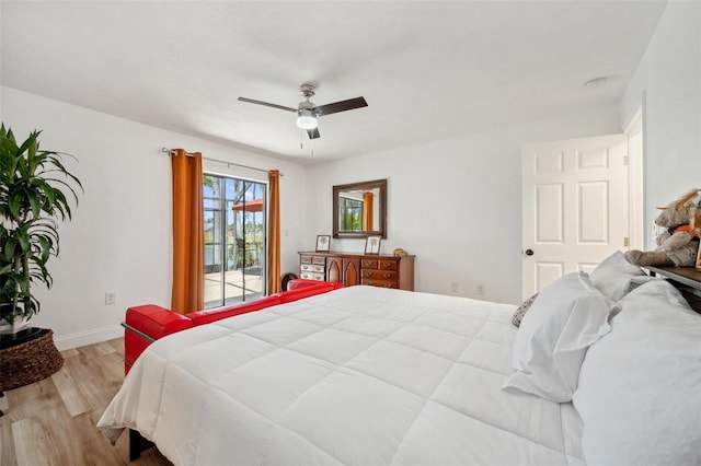 bedroom with baseboards, light wood-type flooring, a ceiling fan, and access to exterior