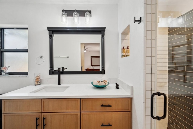 bathroom with vanity and a stall shower