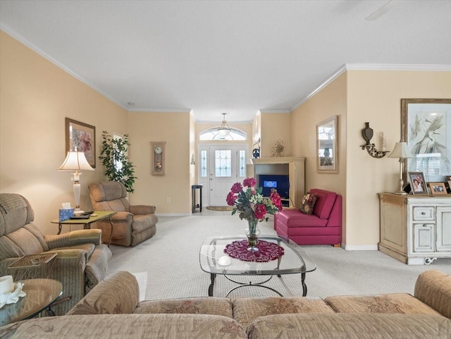 living room featuring carpet floors, baseboards, and crown molding