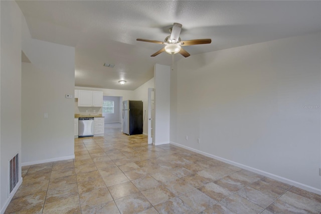 10319 Widgeon Way, New Port Richey, FL 34654 - unfurnished living room with ceiling fan and baseboards