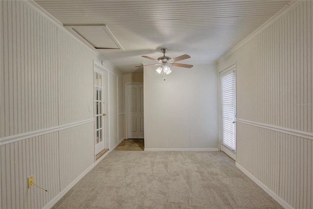 10319 Widgeon Way, New Port Richey, FL 34654 - spare room featuring ceiling fan, crown molding, and carpet flooring