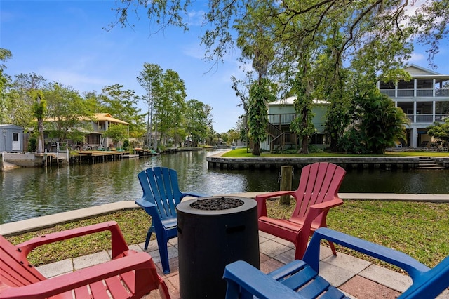 5421 Gay St, Weeki Wachee, FL 34607 - view of dock with a water view and an outdoor fire pit