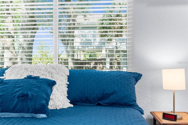 5421 Gay St, Weeki Wachee, FL 34607 - bedroom featuring a textured wall