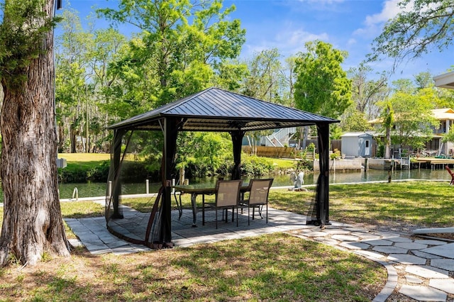 5421 Gay St, Weeki Wachee, FL 34607 - view of community featuring a lawn, a gazebo, a patio, and a water view