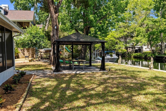 5421 Gay St, Weeki Wachee, FL 34607 - view of yard featuring a patio area, a water view, and a gazebo