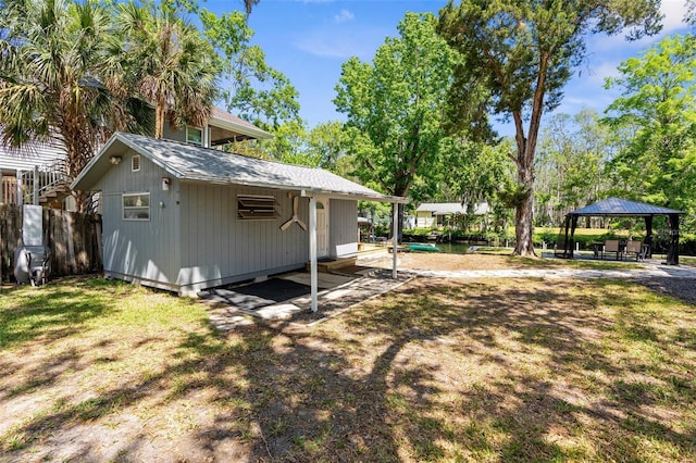 5421 Gay St, Weeki Wachee, FL 34607 - view of yard featuring a gazebo and fence