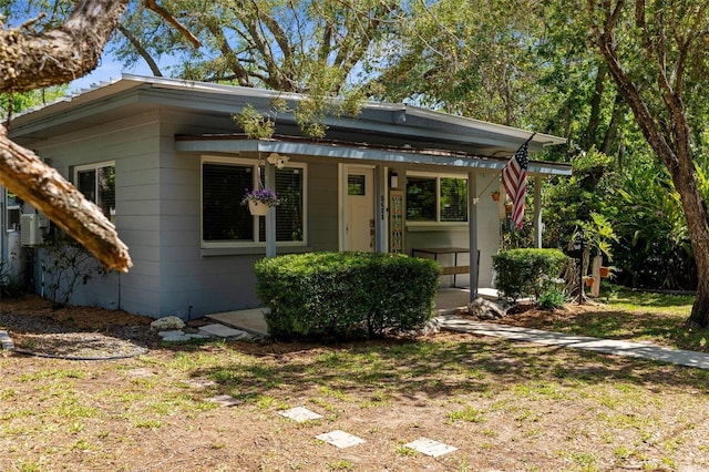 5421 Gay St, Weeki Wachee, FL 34607 - bungalow-style house with covered porch