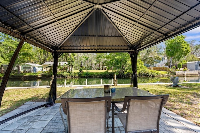 5421 Gay St, Weeki Wachee, FL 34607 - view of patio / terrace with a gazebo, a water view, and outdoor dining space
