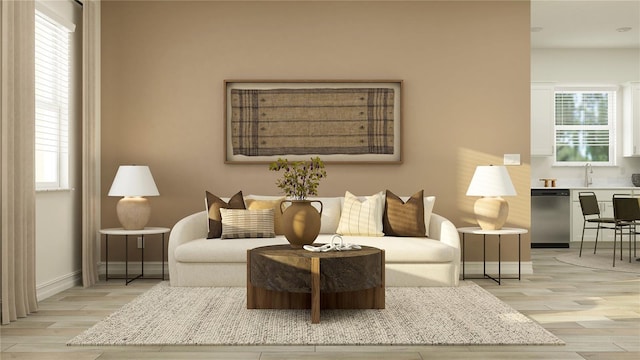 6905 E 116th Ct, Palmetto, FL 34221 - living area with baseboards and light wood-style floors