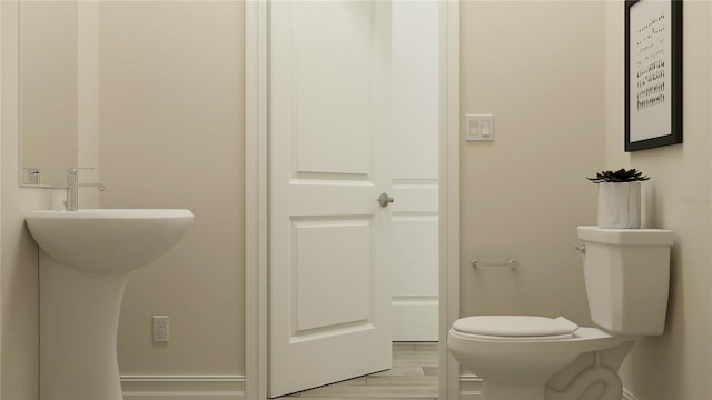6905 E 116th Ct, Palmetto, FL 34221 - half bathroom featuring toilet and baseboards