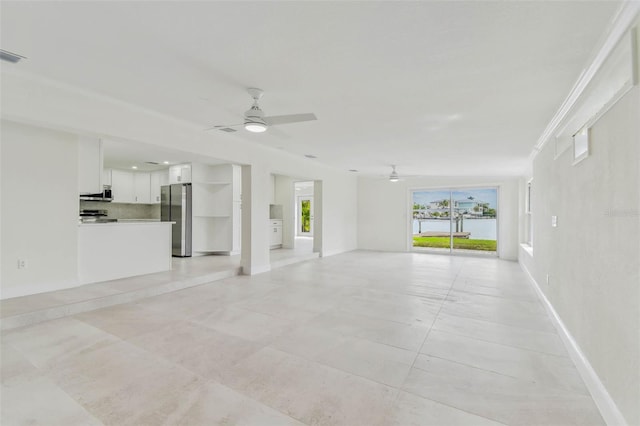 unfurnished living room featuring a ceiling fan, baseboards, and light tile patterned floors