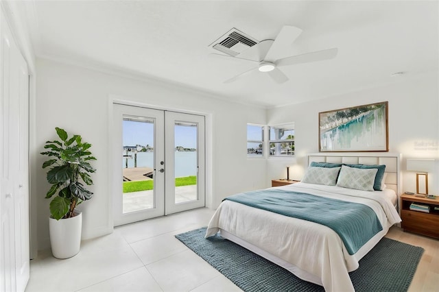 tiled bedroom featuring french doors, access to outside, ornamental molding, and a ceiling fan