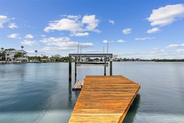 dock area featuring a water view and boat lift