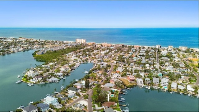 view of property location with a large body of water and nearby suburban area