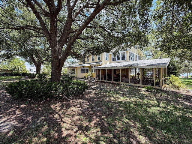 800 W Lake Elbert Dr NE, Winter Haven, FL 33881 - back of property with a sunroom