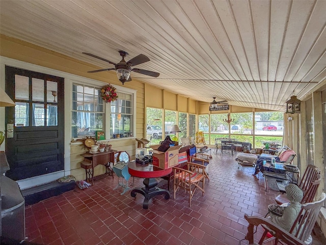 800 W Lake Elbert Dr NE, Winter Haven, FL 33881 - sunroom with a ceiling fan, outdoor dining space, wooden ceiling, vaulted ceiling, and healthy amount of natural light