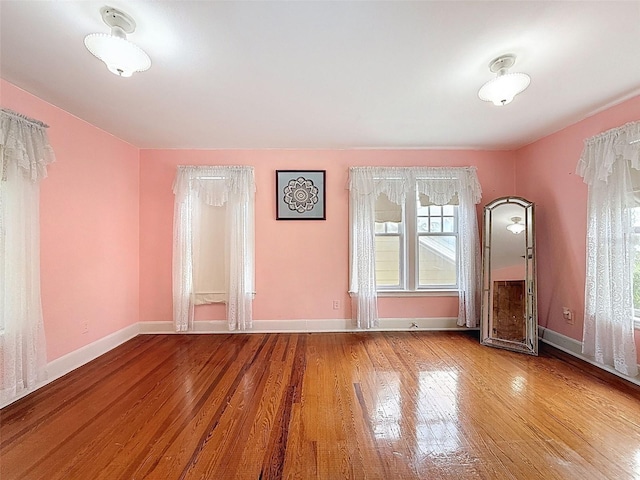 800 W Lake Elbert Dr NE, Winter Haven, FL 33881 - unfurnished room with wood finished floors and baseboards