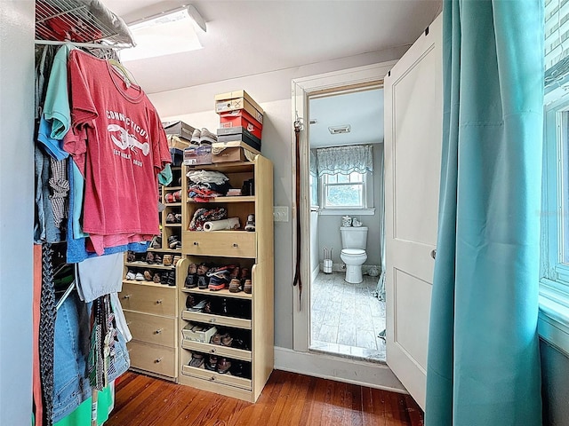 800 W Lake Elbert Dr NE, Winter Haven, FL 33881 - walk in closet featuring wood finished floors