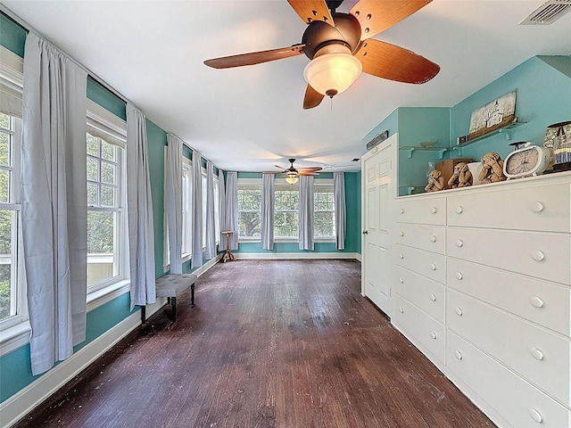 800 W Lake Elbert Dr NE, Winter Haven, FL 33881 - unfurnished bedroom with wood-type flooring and a ceiling fan