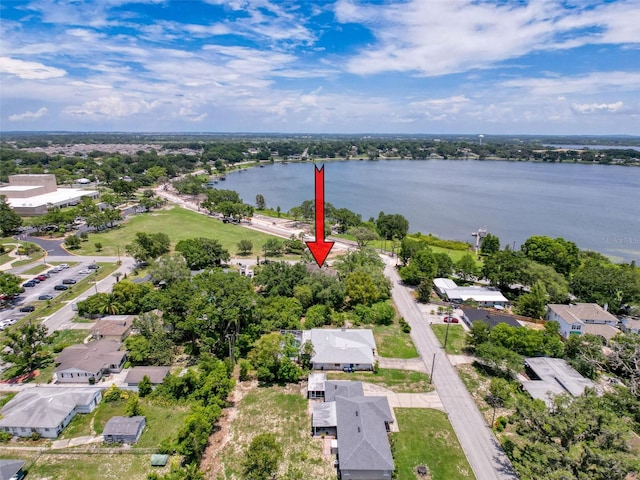 800 W Lake Elbert Dr NE, Winter Haven, FL 33881 - aerial view of property and surrounding area with a nearby body of water and nearby suburban area