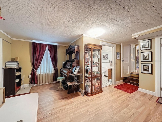 800 W Lake Elbert Dr NE, Winter Haven, FL 33881 - home office with crown molding and light wood-style flooring