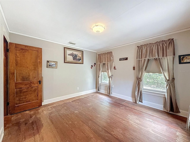800 W Lake Elbert Dr NE, Winter Haven, FL 33881 - foyer featuring crown molding and wood finished floors