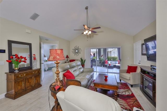 815 Silverthorn Ln Unit 0, Sun City Center, FL 33573 - living area with light wood-style flooring, ceiling fan, and high vaulted ceiling