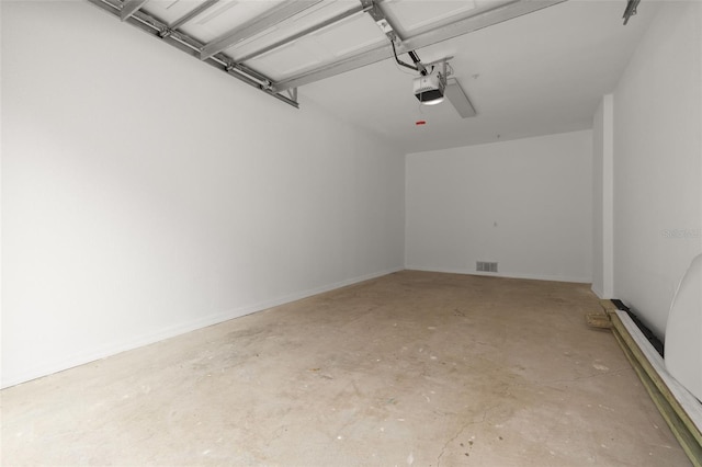 5000 Culbreath Key Way Unit 8-319, Tampa, FL 33611 - garage featuring a garage door opener