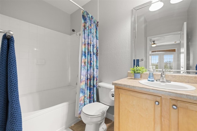 5000 Culbreath Key Way Unit 8-319, Tampa, FL 33611 - bathroom featuring vanity, shower / bathtub combination with curtain, toilet, and a ceiling fan