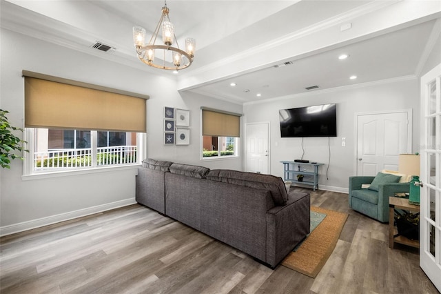 5000 Culbreath Key Way Unit 8-319, Tampa, FL 33611 - living area with crown molding, a chandelier, wood finished floors, recessed lighting, and baseboards
