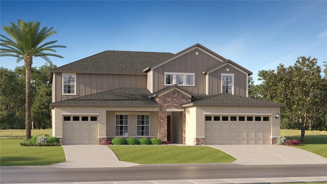 craftsman house with a front yard, an attached garage, a shingled roof, concrete driveway, and stone siding