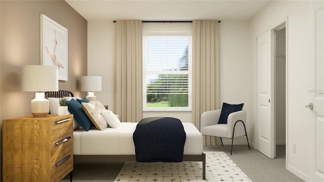 bedroom with baseboards and light colored carpet