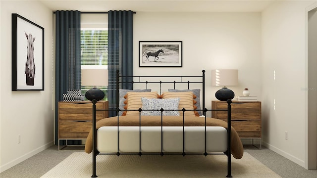 carpeted bedroom with baseboards