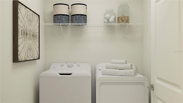 laundry room with laundry area and independent washer and dryer