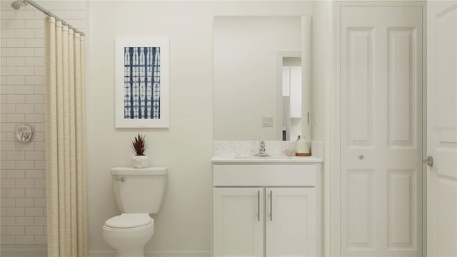 bathroom with vanity, toilet, and a tile shower