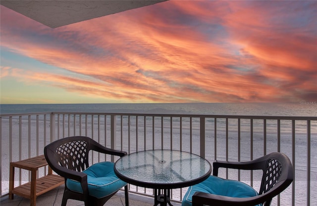 balcony featuring a water view