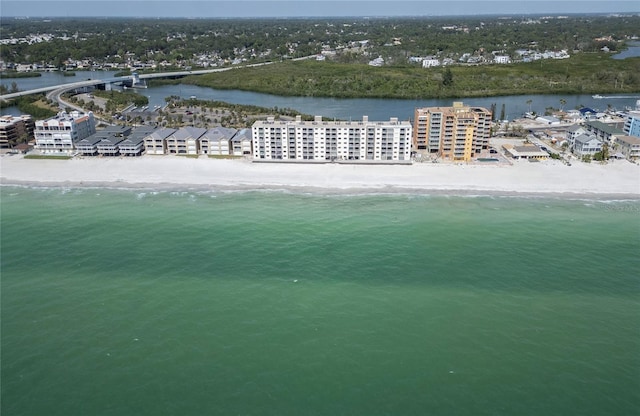 bird's eye view with a water view and a beach view